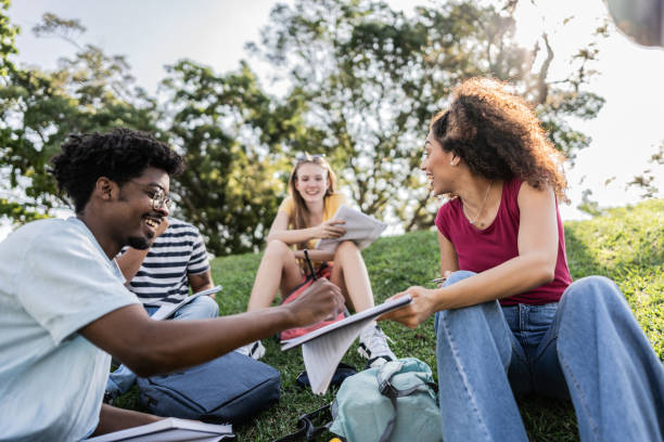 istock Student friends studying at university campus outdoors 1735704047