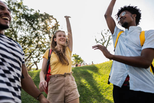 istock Student friends having fun on the park 1735704616
