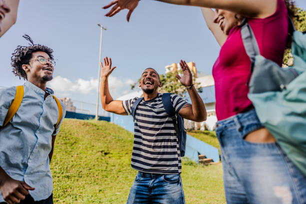 istock Student friends having fun on the park 1735704803