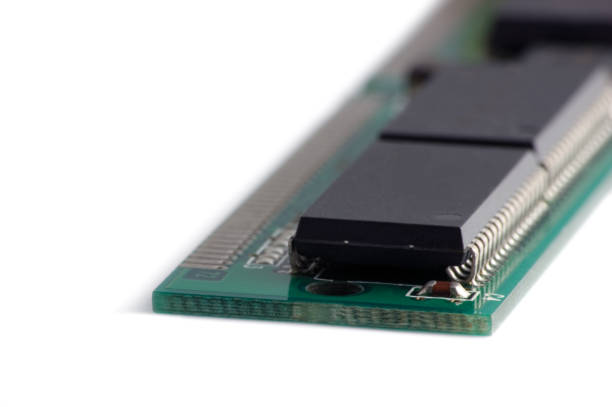 istock Random Access Memory RAM Chip Macro Closeup, Large Detailed Isolated Diminishing Perspective, White Background, Green Printed Circuit Board PCB, Black Banks, Golden Pins 1735716627