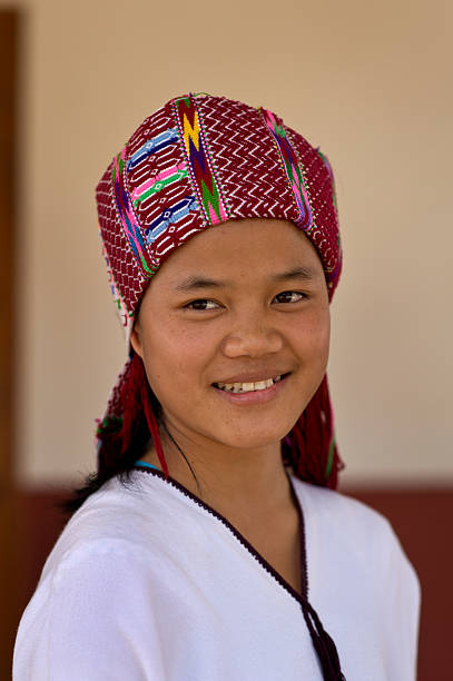 Traditionally dressed Sgaw Karen teenager wearing the white coloured clothing of an single woman. Click the link below to see more of my Karen photos and video