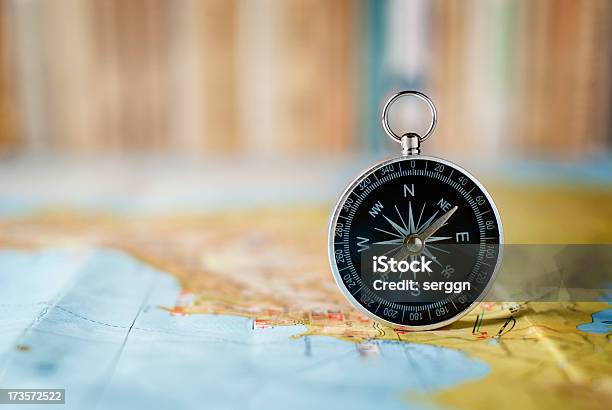 Compass On The Map Stock Photo - Download Image Now - Brown, Cartography, Direction