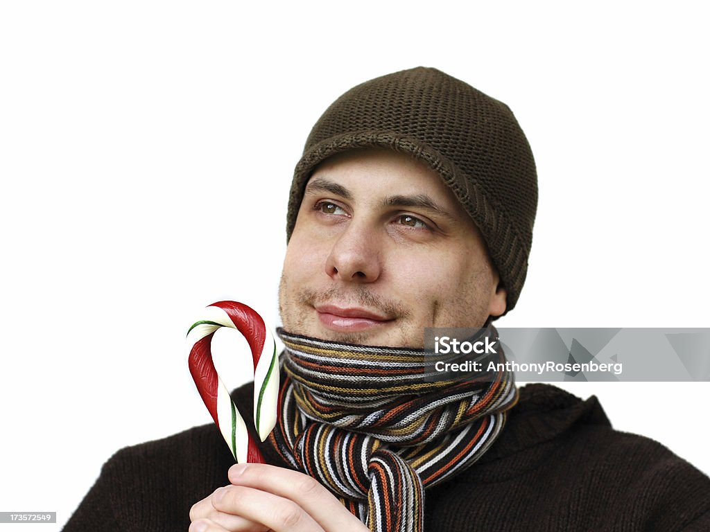 Hombre y caña de caramelo - Foto de stock de Adulto libre de derechos