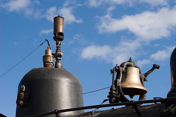The bell and whistle on top of a steam locomotive.