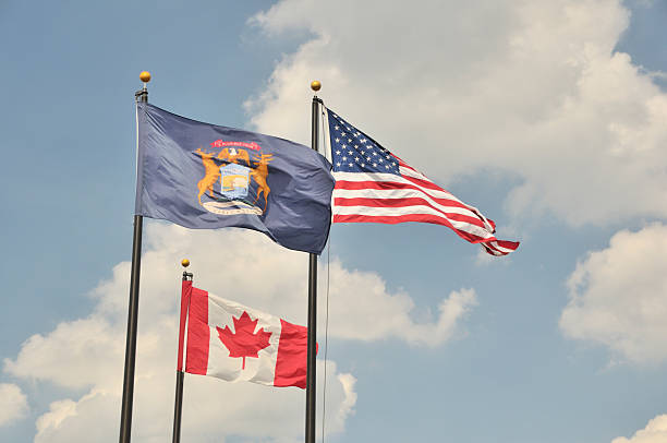 istock The American, Michigan, and Canadian Flags 173573178