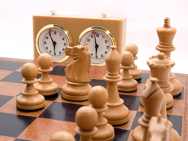 Chess Game White Kings side position in a game of speed chessOther chess images: chess timer stock pictures, royalty-free photos & images