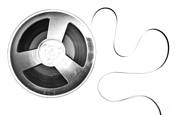 bobina nastro audio o film isolato su bianco - reel to reel tape foto e immagini stock