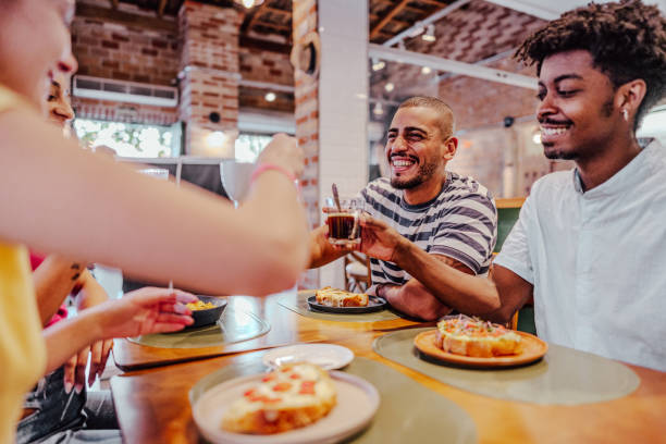 istock Friends toasting at coffee shop 1735740567