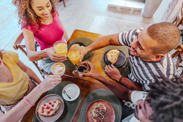 istock Friends toasting at coffee shop 1735740574