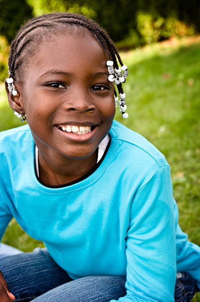 istock Happy Young Girl Smiling Outside 173574160