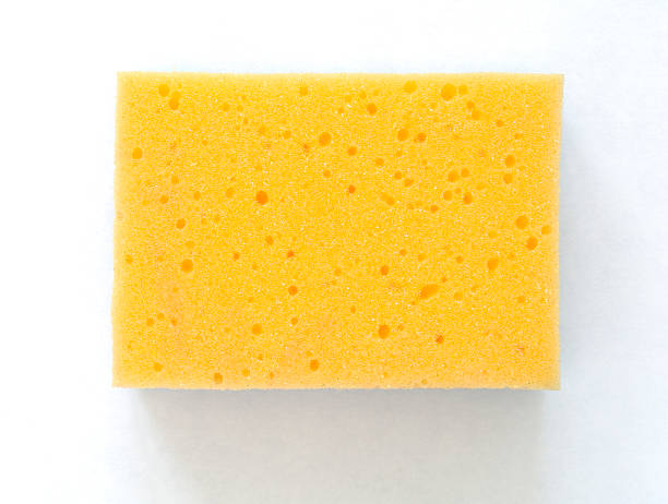Yellow Cleaning Sponge on White This Picture is made in my Daylight Studio. bath sponge photos stock pictures, royalty-free photos & images