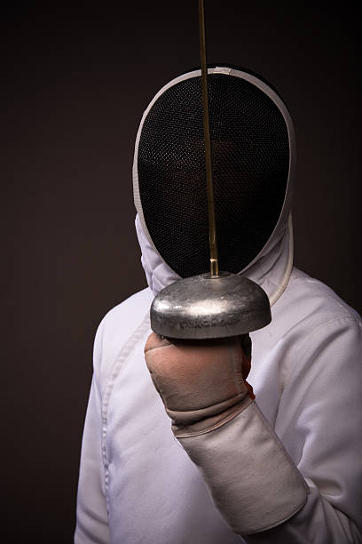 istock Man in fencing gear 173574807