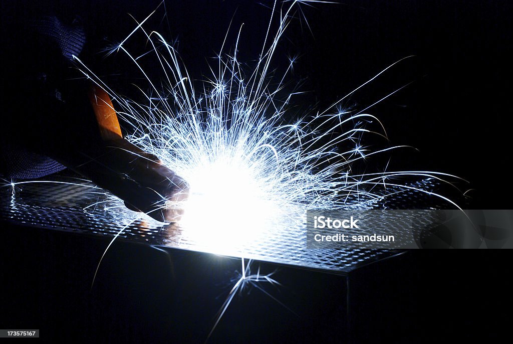 blue shine welding Welder Stock Photo