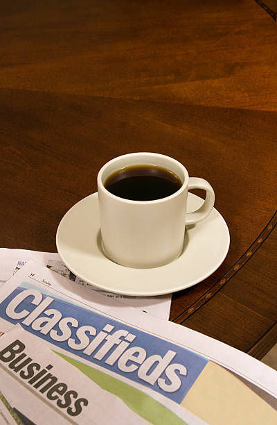 istock cup of black coffee with classifieds 173575902