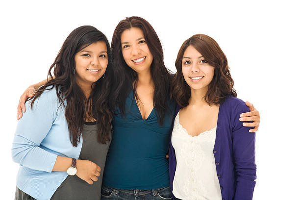 istock Hispanic Mother and Daughters on White 173576524