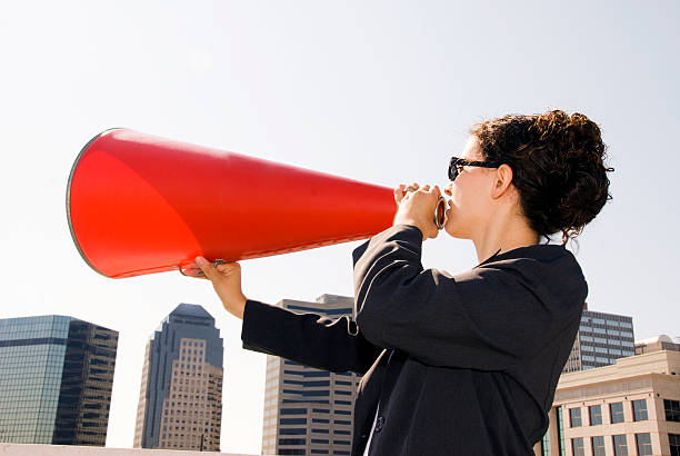 ビジネスウーマン - complaining megaphone speech businesswoman ストックフォトと画像