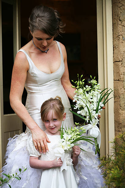 istock Bride and flower girl 173577068