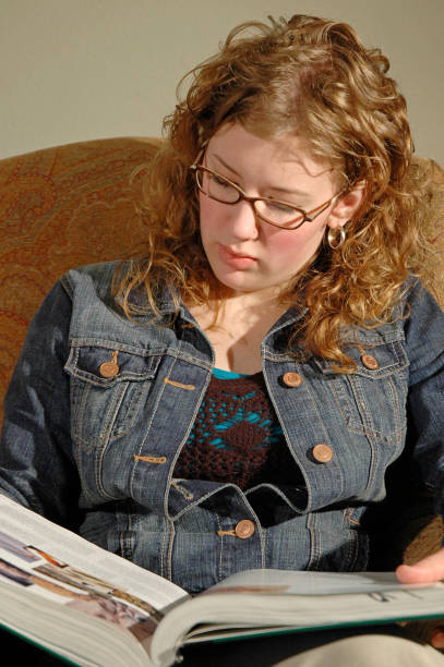 Young woman studying biology