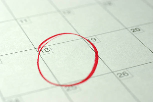 Important! Red circle marked on a calendar. calendar date circled stock pictures, royalty-free photos & images