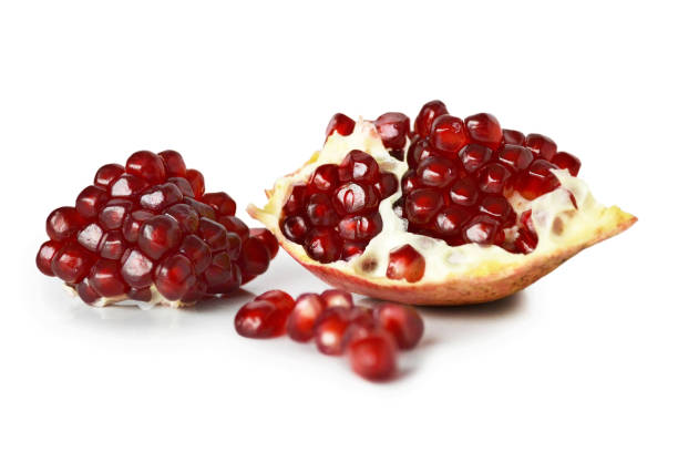 istock Close up of fresh pomegranate pieces and seeds 1735779498
