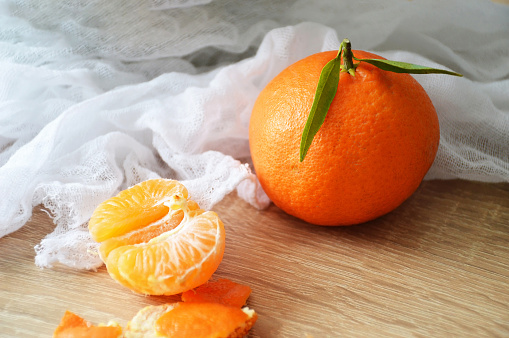 Fresh tangerine on wooden background