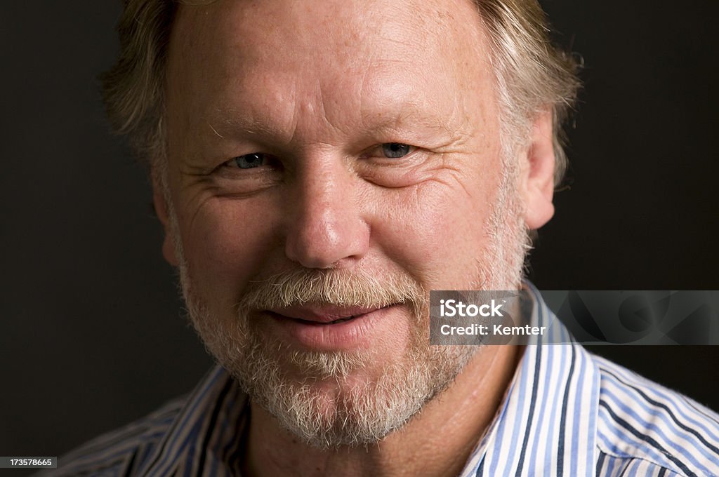 senior man close up isolated on black 50-59 Years Stock Photo