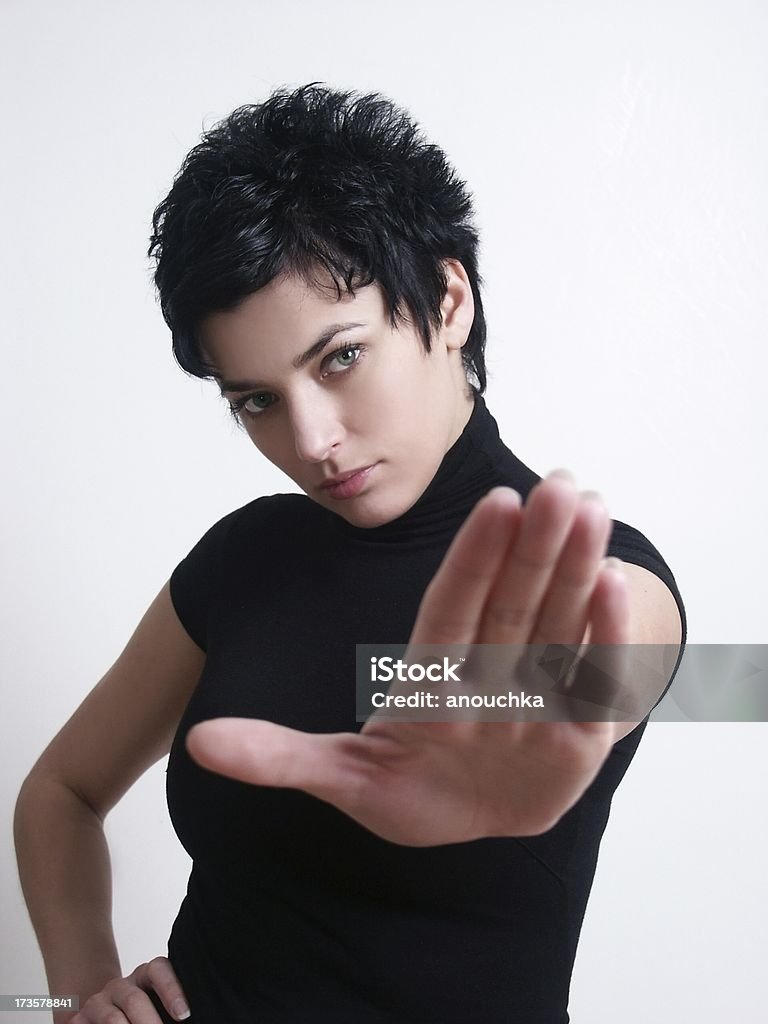 Don't do it! young woman doing Stop to camera (focus on face) 20-24 Years Stock Photo