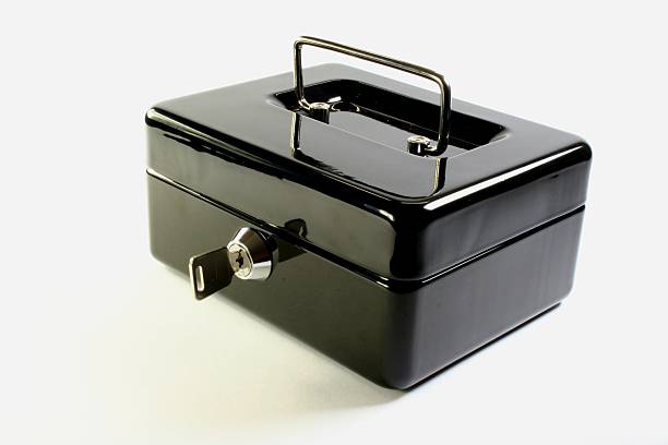 istock cash money box with key 173578843