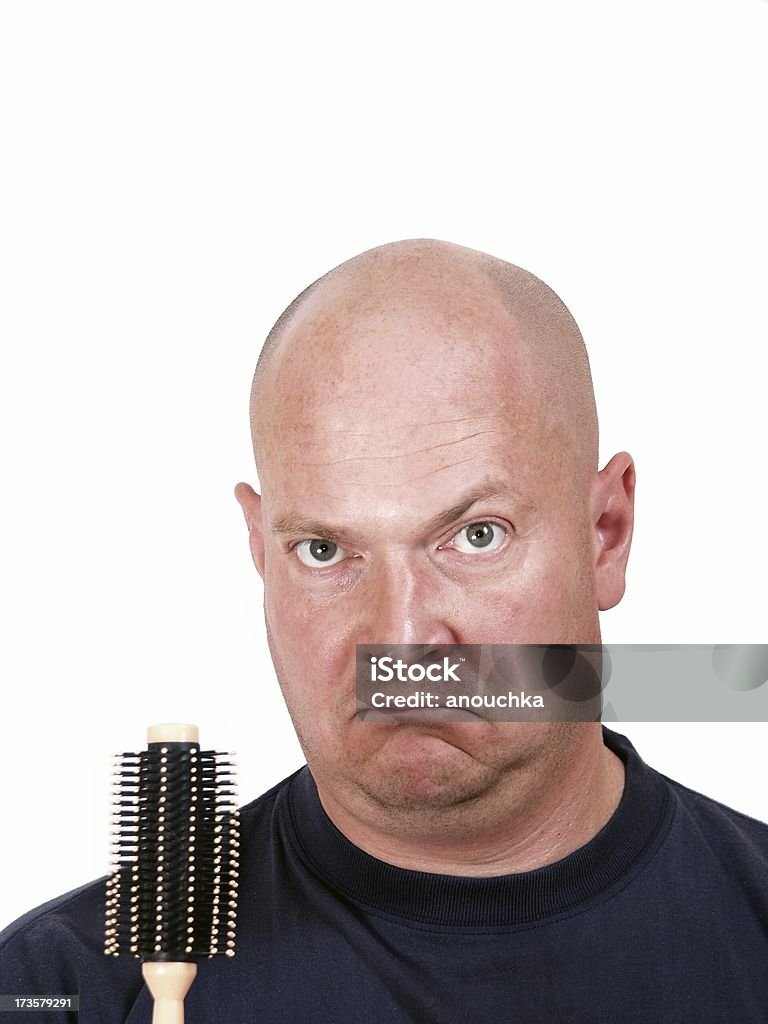 bald man & hairbrush (vertical) funny bald man looking at you, thinking what this hairbrush is for... surprised 30-39 Years Stock Photo