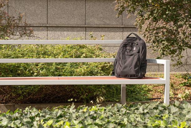 istock Suspicious Backpack on Bench, Threat Bag, Warning Symbol 1735793950