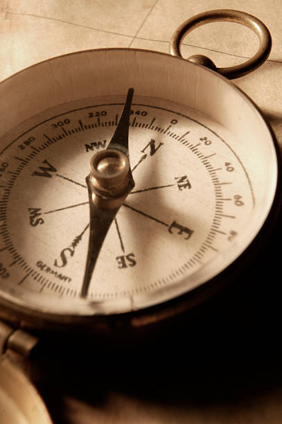 istock Close Up of Compass On Antique map 173579850