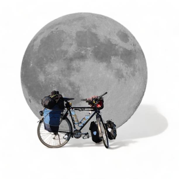 istock Moon with travel bicycle on white background- 1735803268