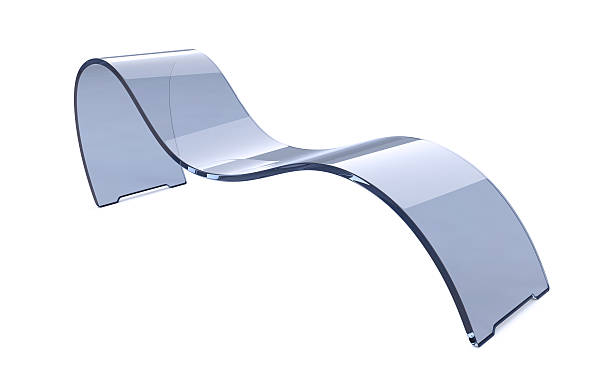 A fluid metallic surface with a glossy finish flows against a dark background