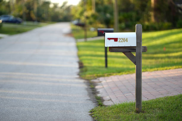istock Typical american outdoors mail box on suburban street side 1735811633