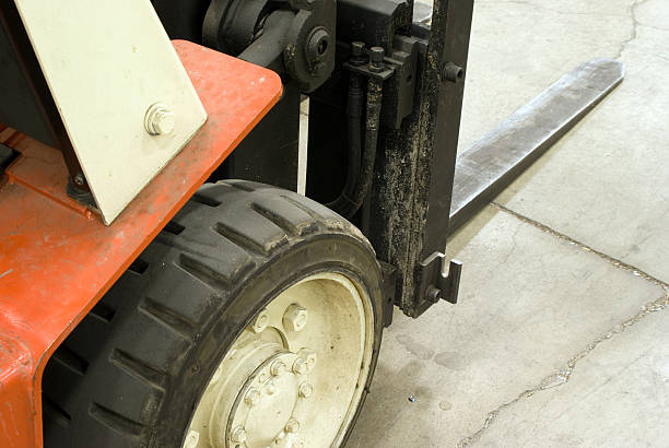 Close up view of an industrial forklift. 