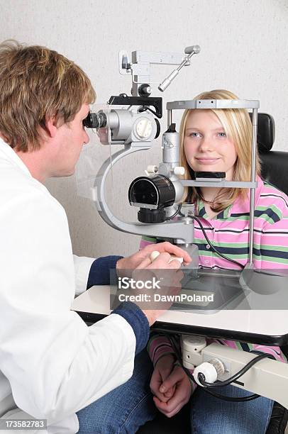 Eye Exam Stock Photo - Download Image Now - Adolescence, Adult, Child