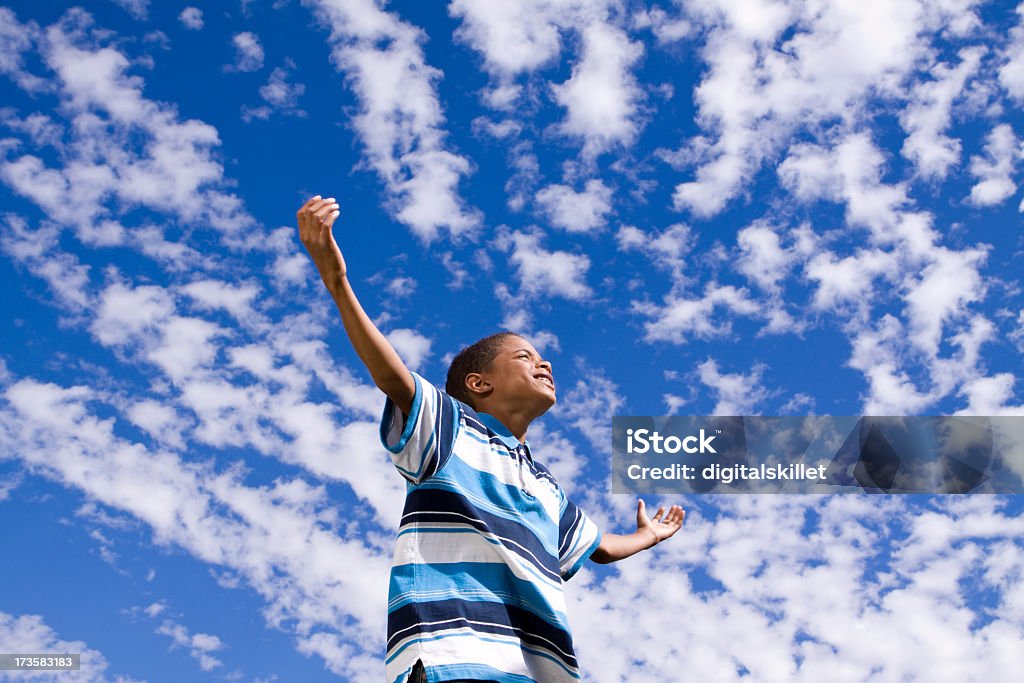Boy In Clouds Achievement Stock Photo