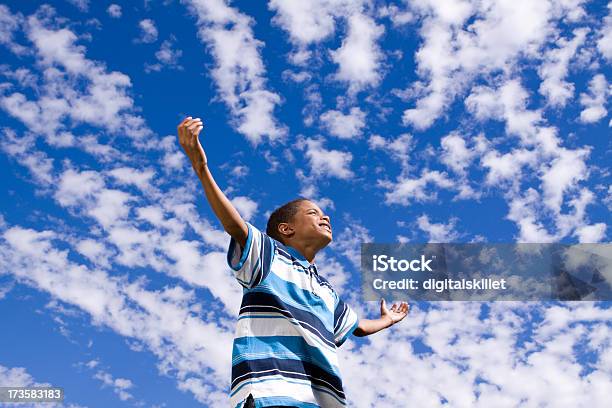 Boy In Clouds Stock Photo - Download Image Now - Achievement, African Ethnicity, African-American Ethnicity