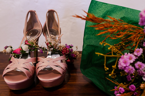 Wedding shoes and flowers for a bride