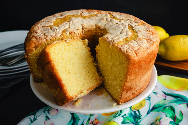 istock Lemon Pound Cake on a White Cake Stand 1735834611
