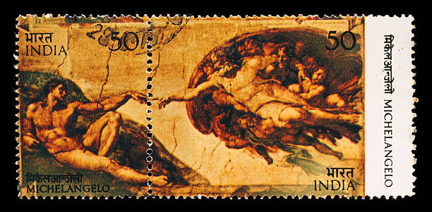 istock Michelangelo's Creation of Adam postage stamps 173583692