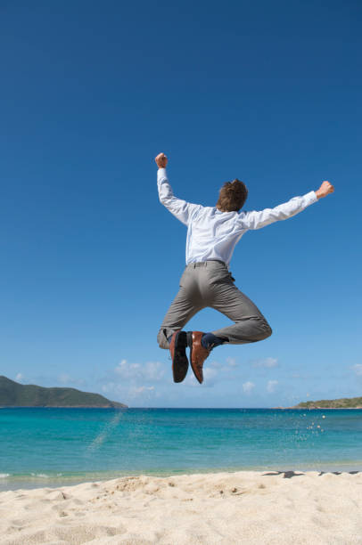 istock Businessman Kicks Up His Heels 173584159