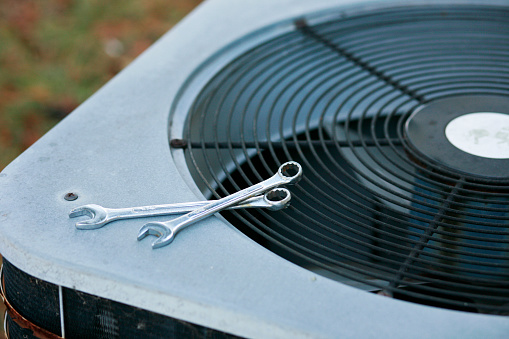 An air conditioner being fixed