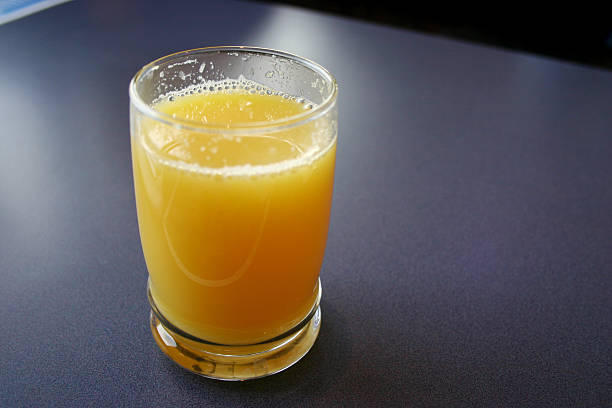 Glass of Orange Juice stock photo