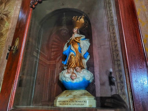 detail of image of a saint inside the Basilica Nuestra Señora del Rosario y San Benedito de Palermo in the center of Paysandú in Uruguay