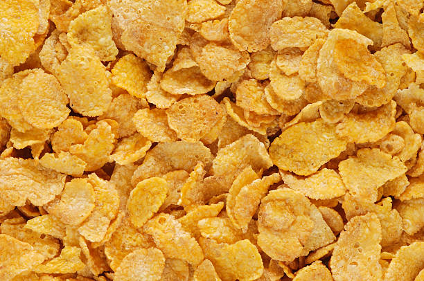 corn flakes (copos de maíz) - corn flakes fotografías e imágenes de stock