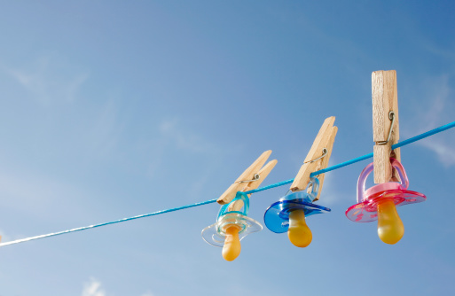 Pacifiers in clothes line