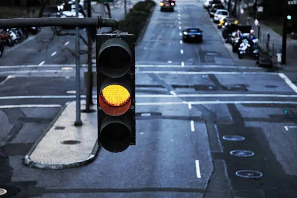 Photo of Close up of a traffic light on yellow