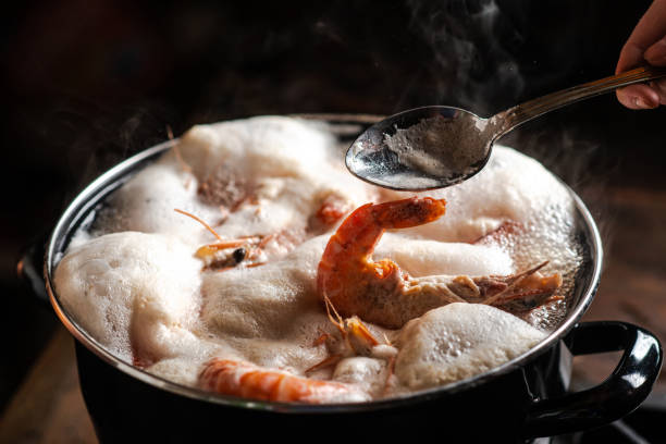 istock Large king prawns are boiled in a saucepan. 1735865599