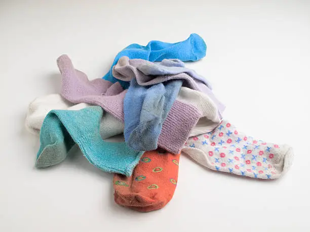 Photo of Pile of old mismatched socks